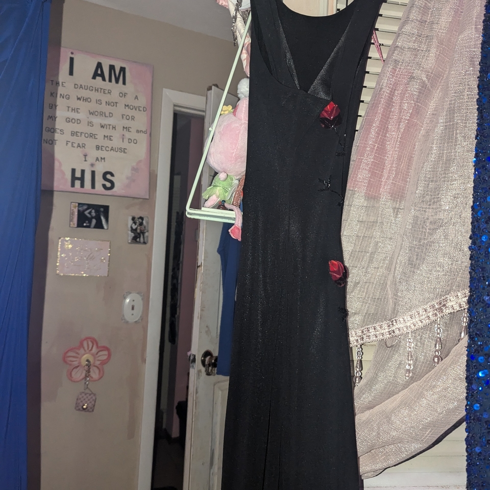 Elegant Black Dress with Red Rose Accents